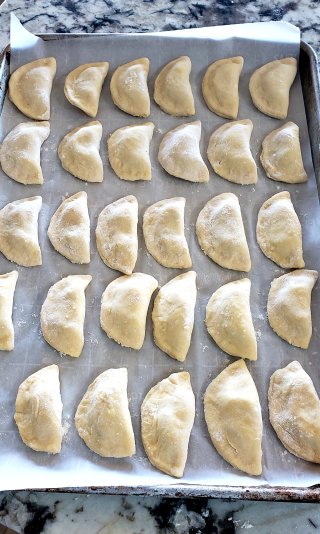 Pierogies on baking sheet