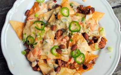 SAUCY NACHOS WITH P-P-P-PEPPERED QUESO